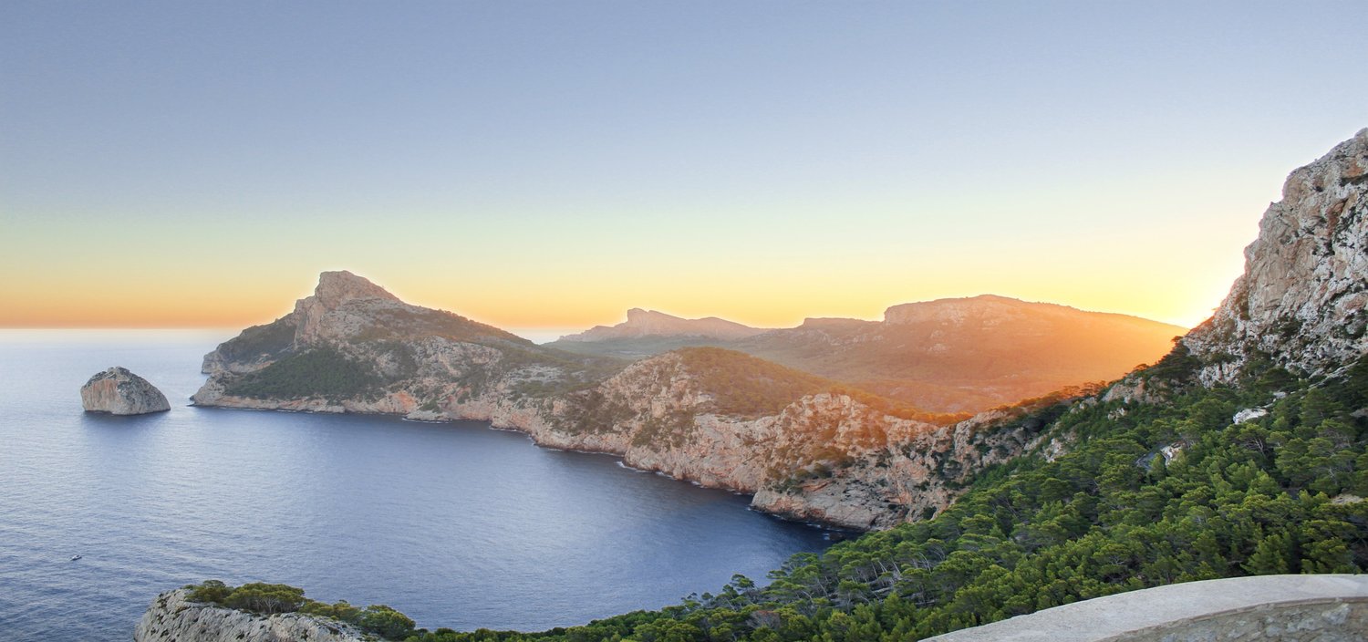 The Balearics yacht charter sails you around stunning peninsulas at sunset